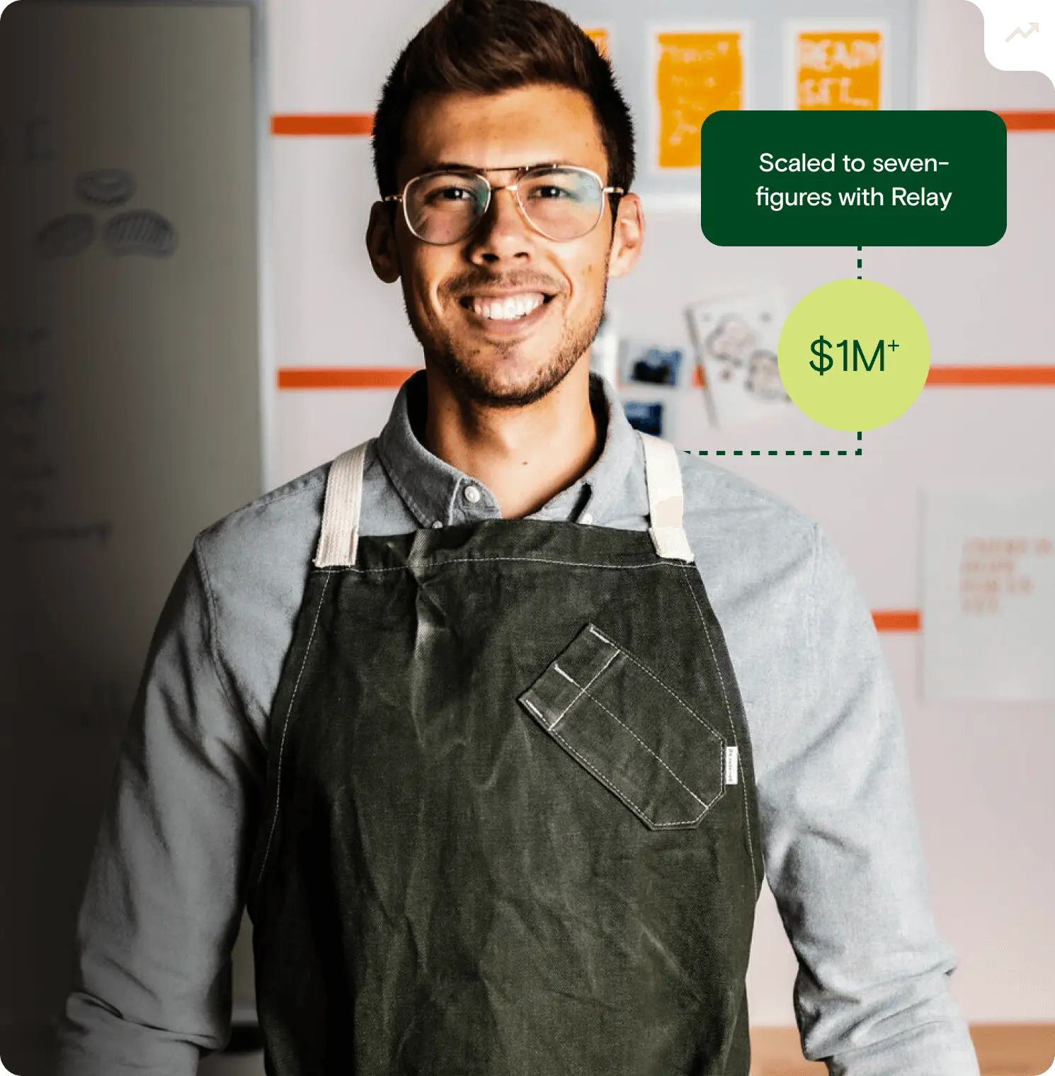 Zach wearing an apron smiling